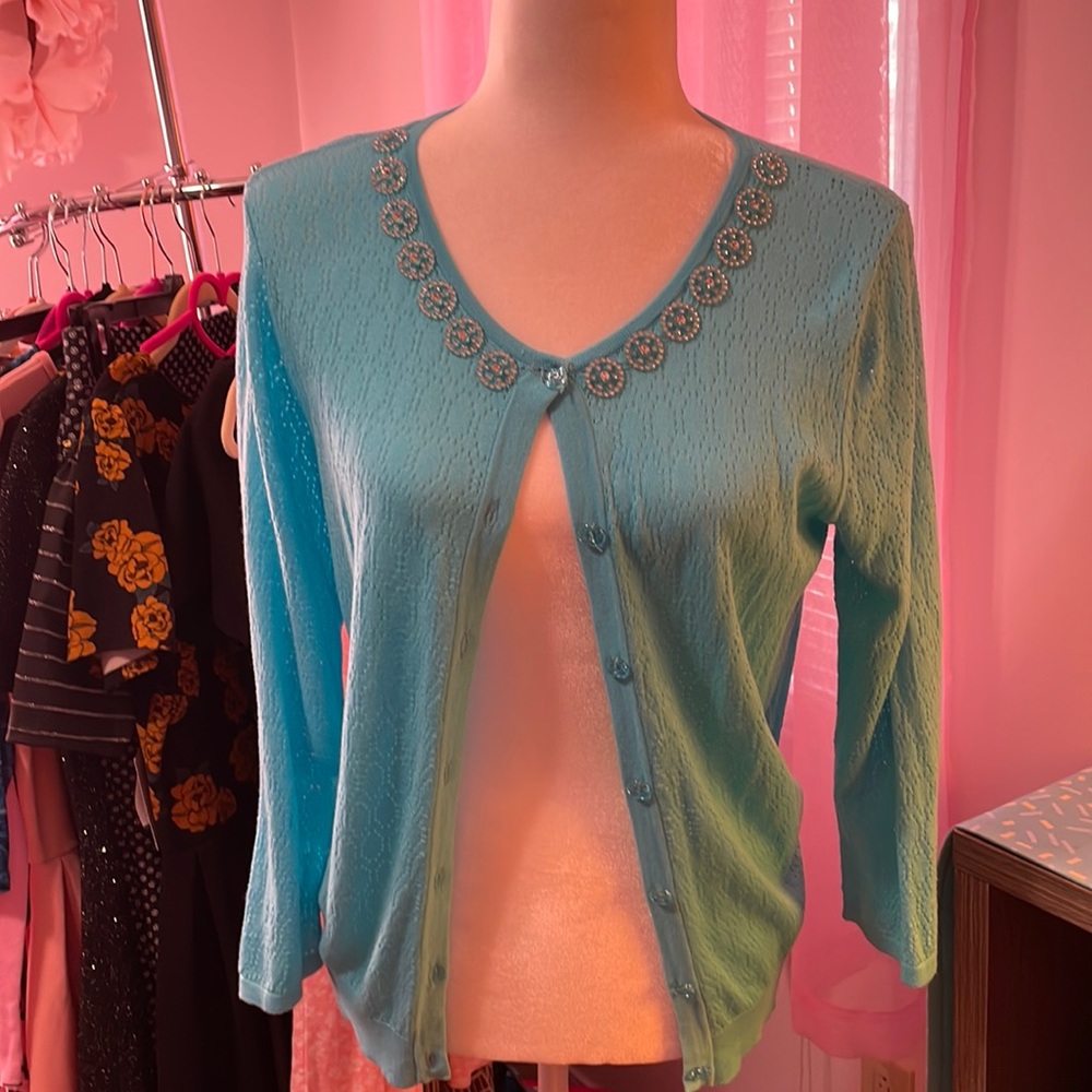 Turquoise colored button up cardigan size medium